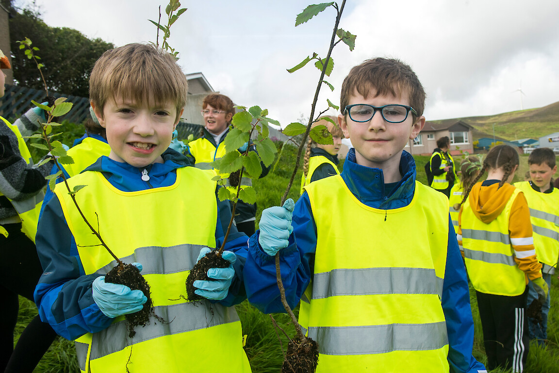 Tree planting at Holmsgarth Brae with Bell's Brae School, Shetland Amenity Trust and Viking Energy Windfarm Project.